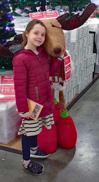 Freya and Alice at Country Market - they wouldn't pose together by the reindeer, hence two photographs!